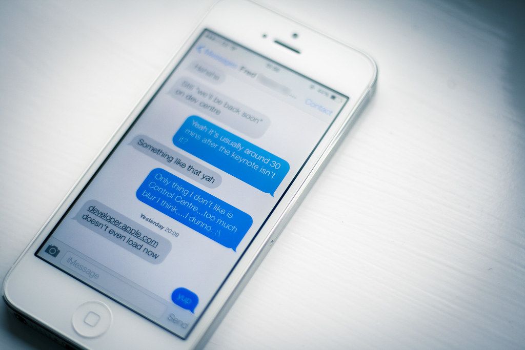 A smartphone screen showing a chat conversation with message bubbles